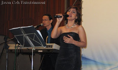 Singer and Keyboardist performing Live at Malaysia SME Congress