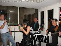 Another image of a guest at the event singing along with the Live Band