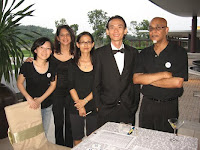 a photo of Jason Geh with members of the organizers