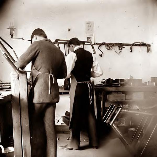 Wilbur Wright in bicycle shop. 1897, Dayton, Ohio