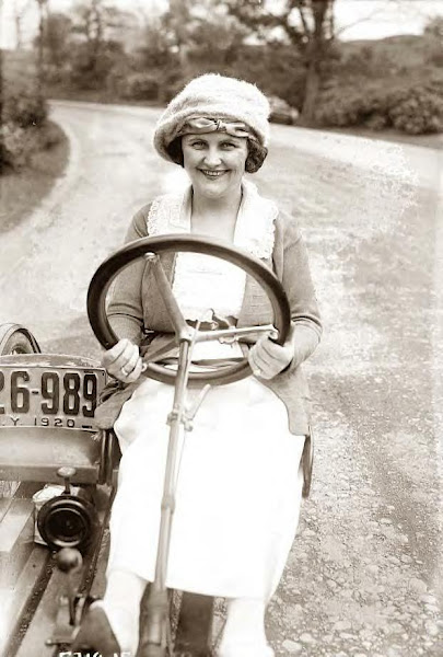 Byron's wife driving his little car the year before in 1920, photo-2