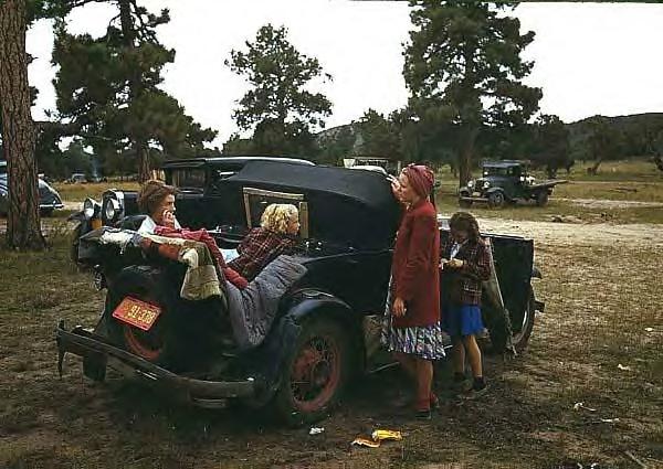 Model A Ford & family at fair, 1940