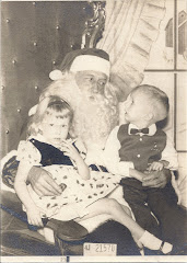 First visit with Santa Claus, Johnny and Millie Evans