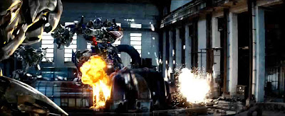 Prime's two guns aimed at Megatron
