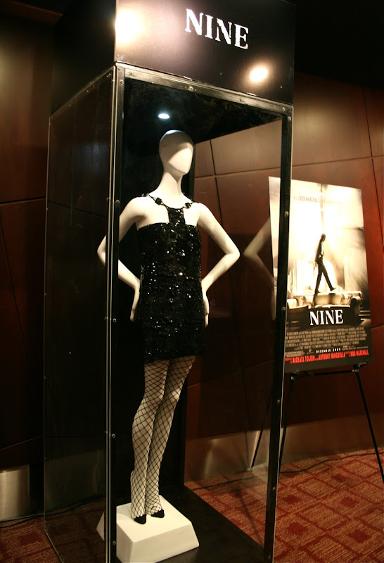 Nine Kate Hudson black dress film costume