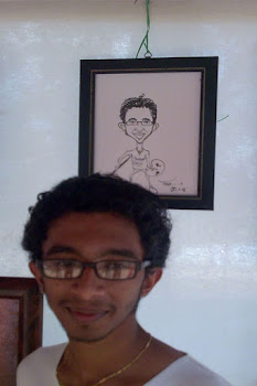 prashanth-abstract artist-along with his caricature framed