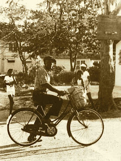 Joseph Spence on Bicycle