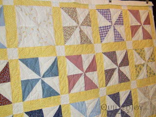 Katy's Pinwheel Party, quilted by Angela Huffman