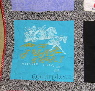 Laura's Graduation T-Shirt Quilt, quilted by Angela Huffman