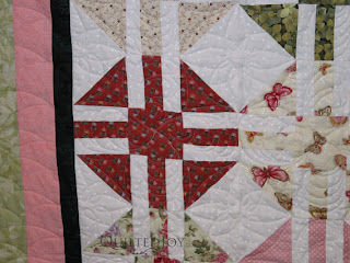 Debbie's Crystal Beauty, with custom quilting by Angela Huffman - QuiltedJoy.com