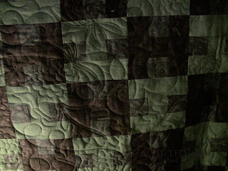 Flannel Pine Cone Quilt with edge to edge quilting by Angela Huffman