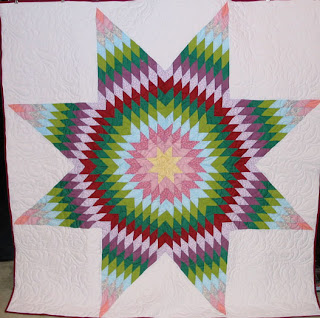 Lone Star Quilt with edge to edge quilting by Angela Huffman - QuiltedJoy.com