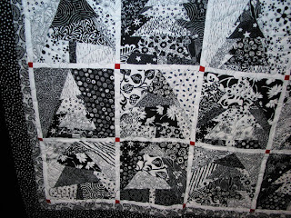 Modern Christmas tree wall hanging with a great graphic contrast! Longarm quilting by Angela Huffman - QuiltedJoy.com