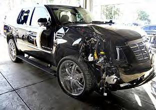 [see+Tiger+Woods's+Smashed-Up+Car.jpg]