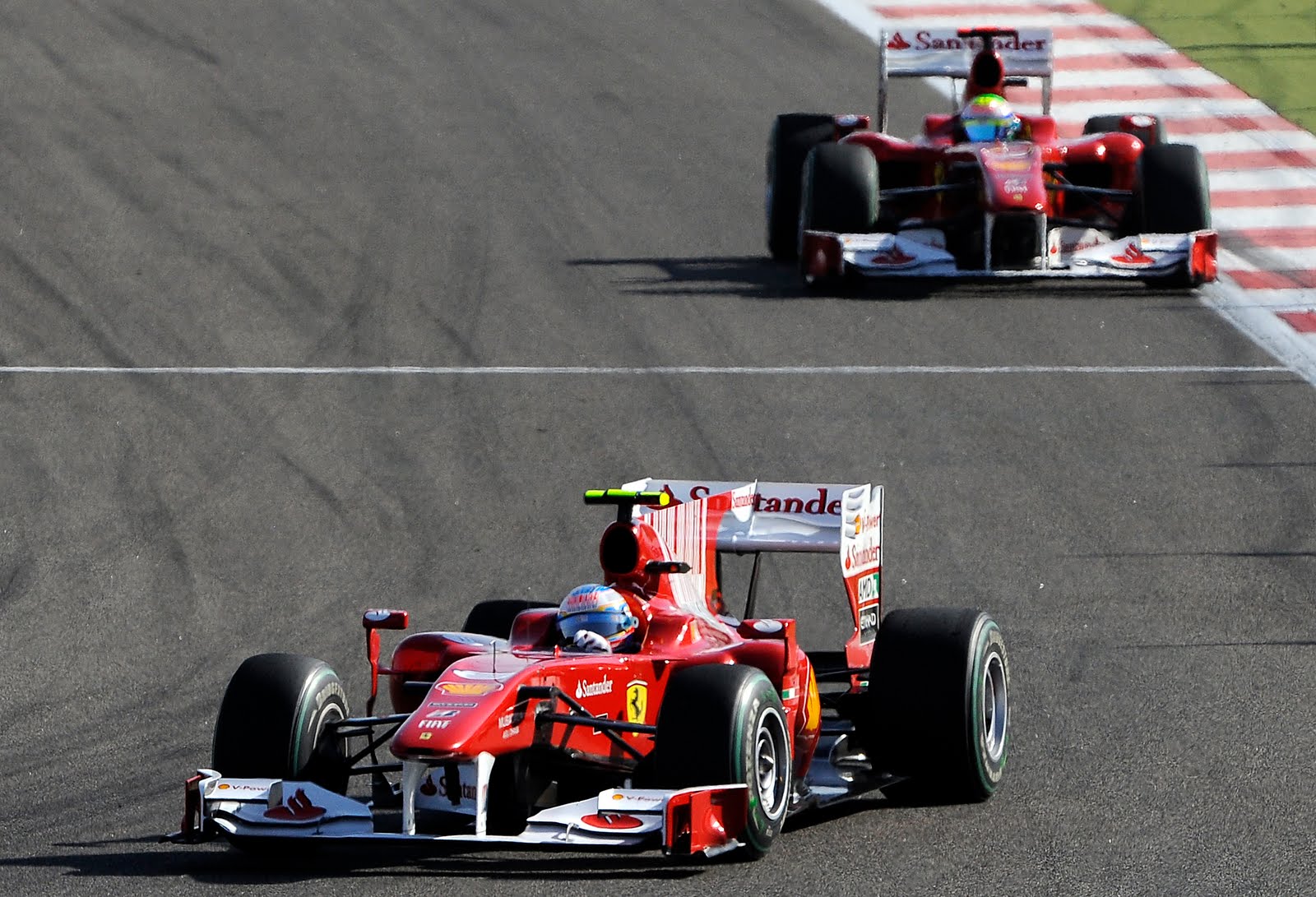 [Fernando+Alonso+drives+ahead+of+Ferrari's+Brazilian+driver+Felipe+Massa.jpg]