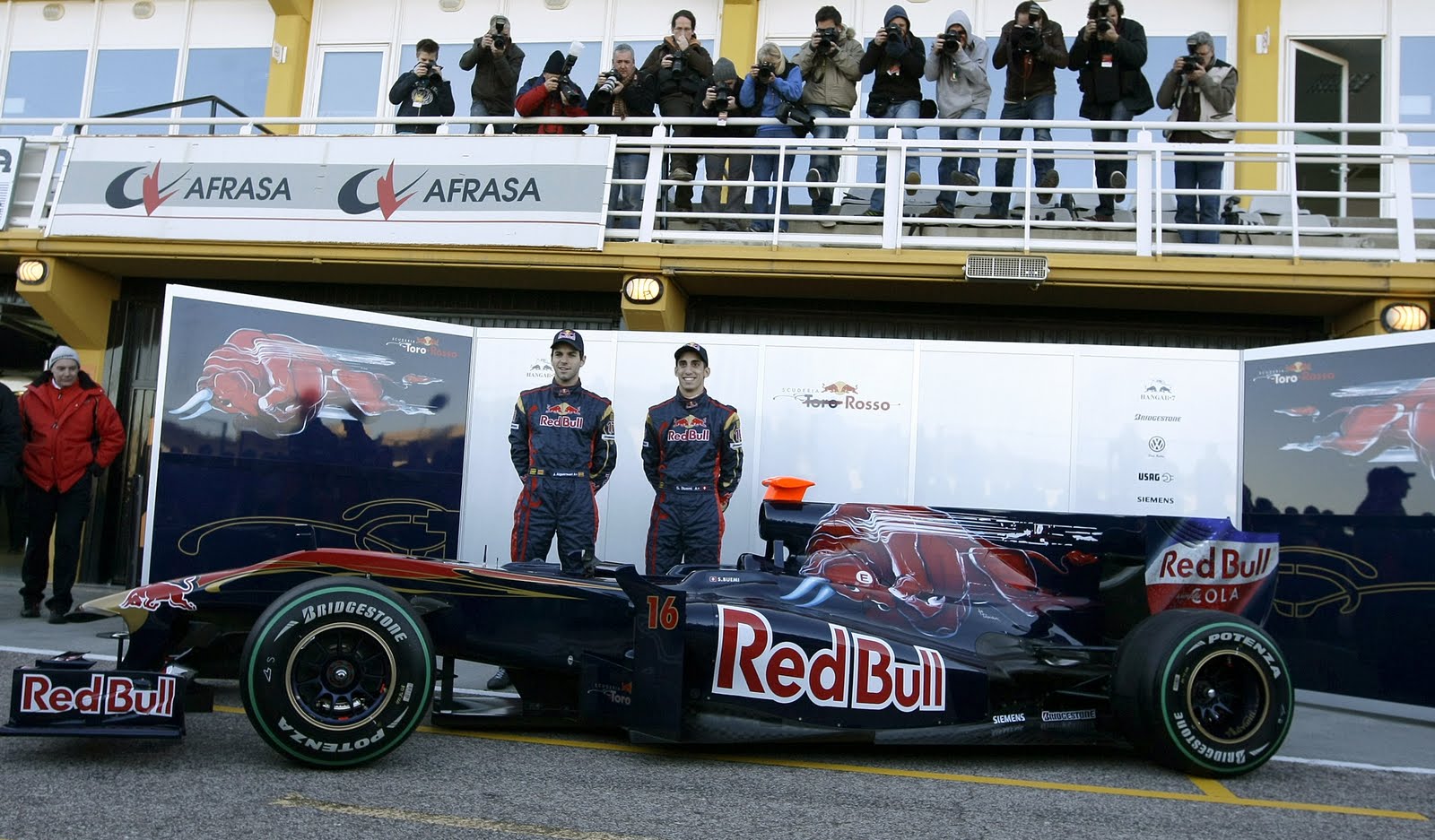 [Jaime+Alguersuari+(L)+and+Belgian+Sebastien+Buemi+(R)+unveil+the+new+Toro+Rosso+STR5.jpg]