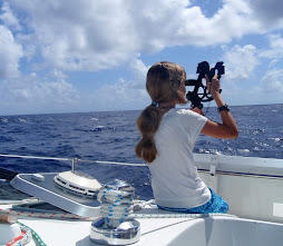 Shelby doing some shots on our crossing to the Tuamotus