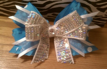 Bows!! Tons of different ribbons! Just ask if you need a certain kind!