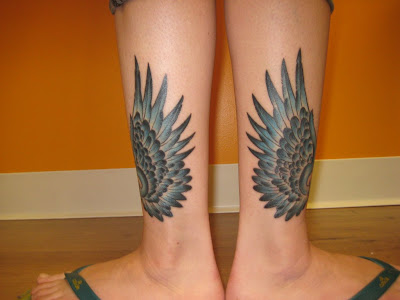 Hermes wings tattoo on both feet