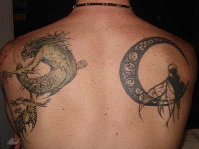 calla lily tattoo designs. full back piece tattoo sun and moon tattoos