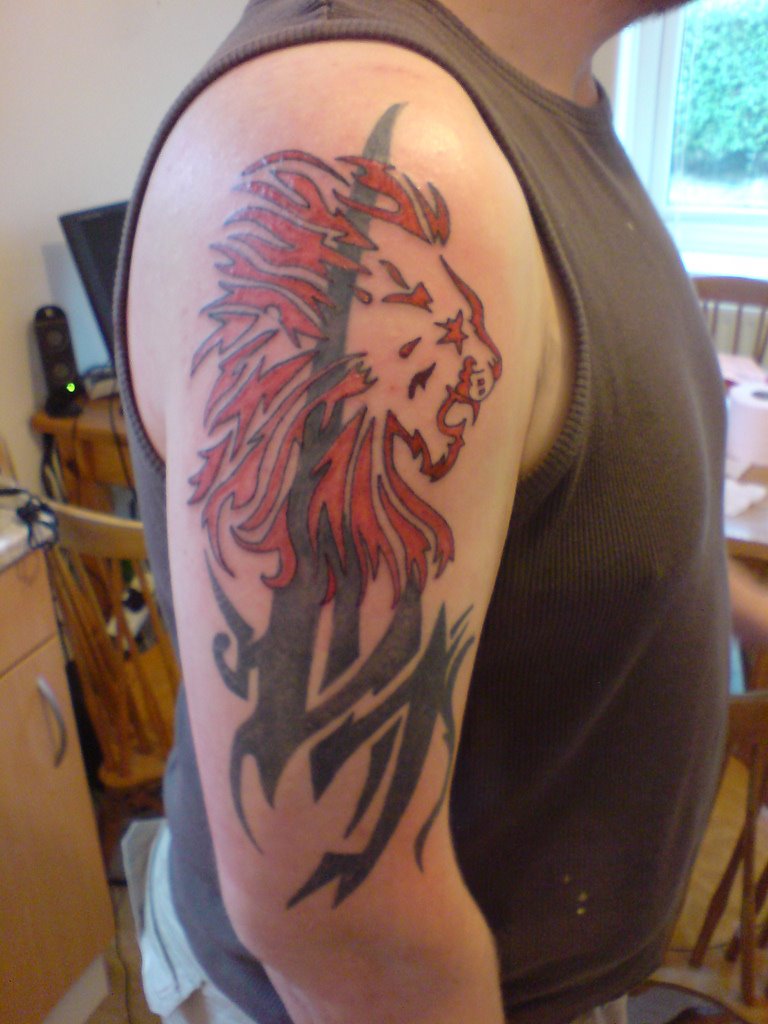 [red_tribal_lion_tattoo.jpg]