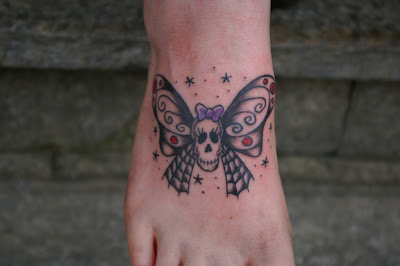 Butterfly Tattoos  Foot on Skull Butterfly Tattoo At The Foot  Image Credit  Link