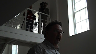 Hearts and minds filming Mick standing on top of a chair - the first time of many this afternoon!