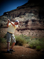 Western Novel Author Stephen Bly playing golf in desert