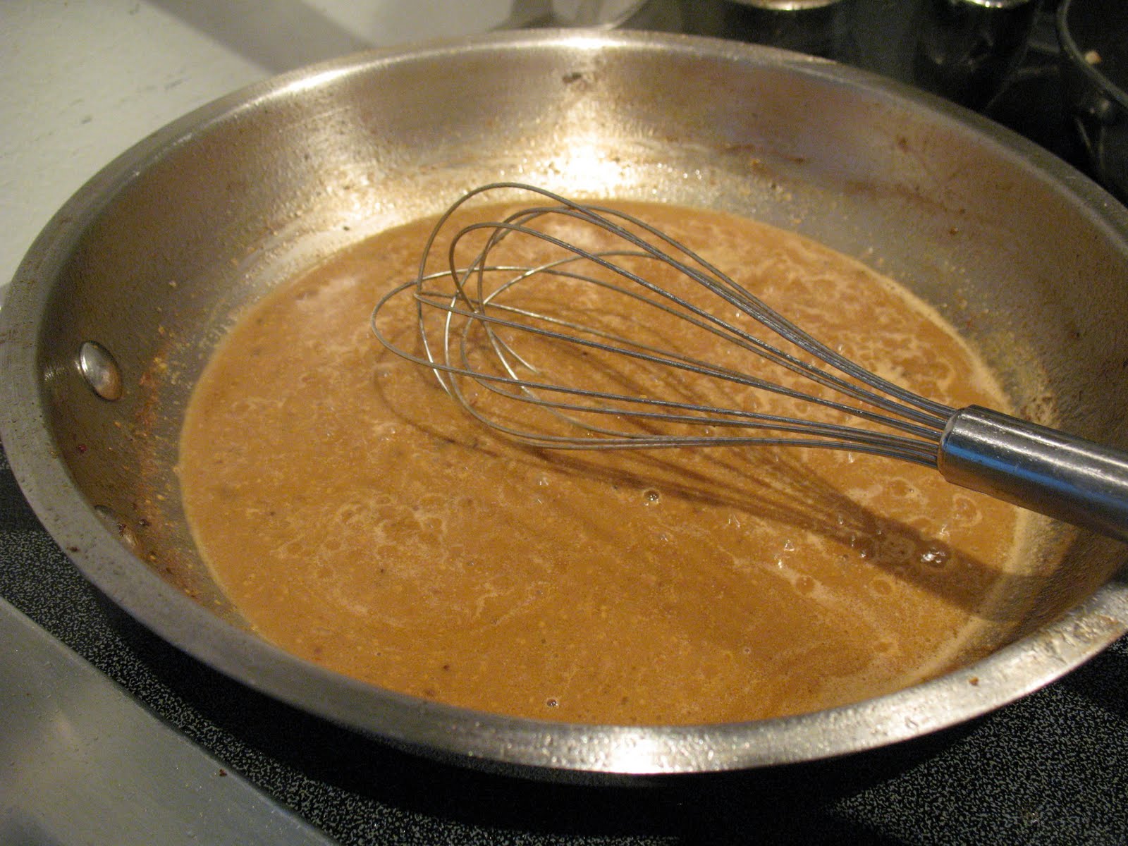 Anna's Table Stuffed Pork Tenderloin with Dijon Mustard Brandy Sauce