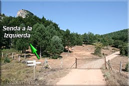 Tras la barrera, senda a la izquierda
