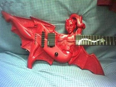 http://4.bp.blogspot.com/_IUYlNU10BMY/SoUNz1bRNeI/AAAAAAAAg4o/kbGtd9ZDK84/s400/strange-guitars-23.jpg