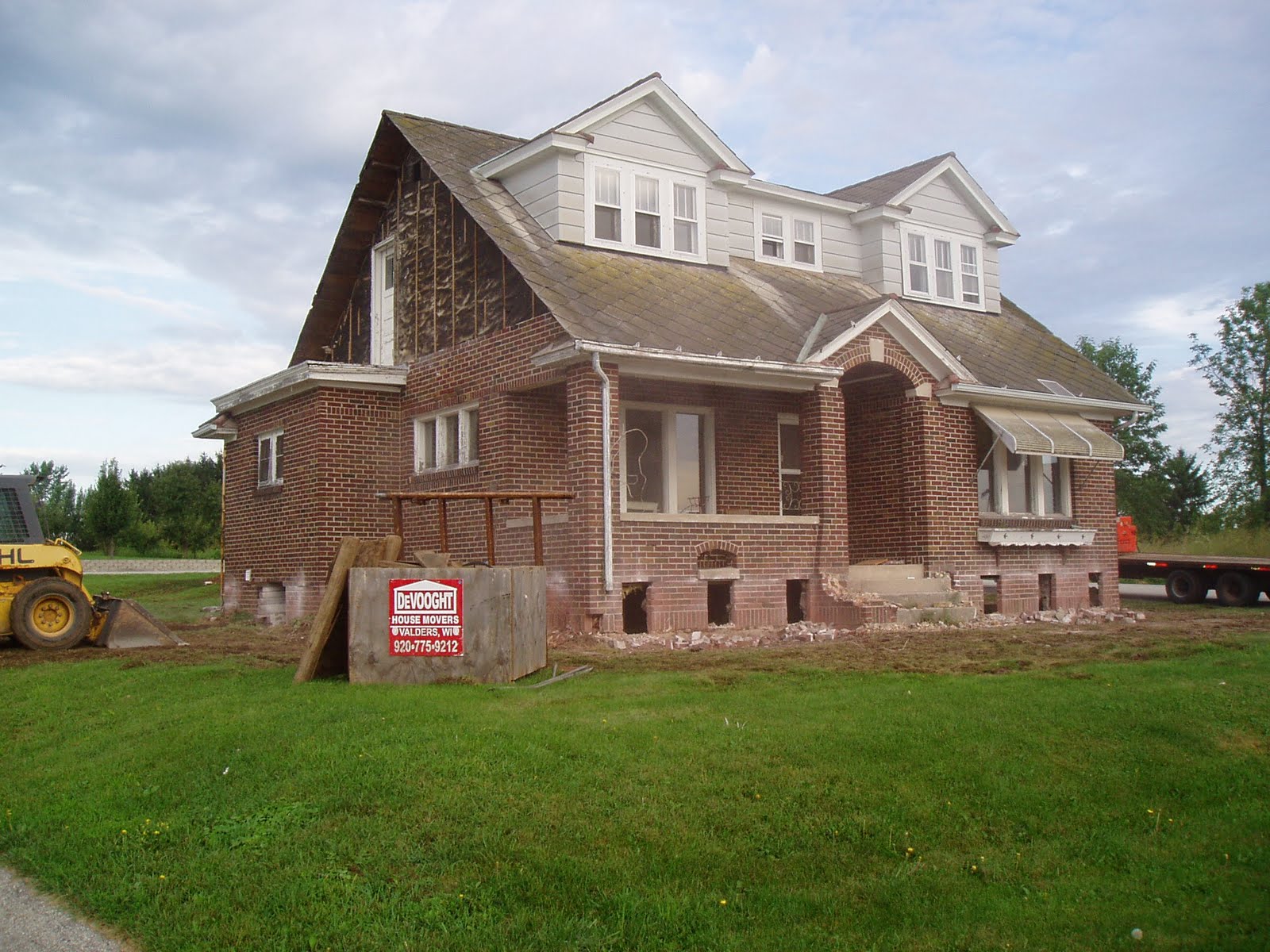 The Little Brick House in Manitowoc Knocking off the Brick