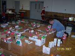 Commander Jerry Parrish packing gift baskets