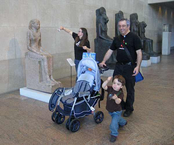 Tourist Whirlwind - Friends from out of town fly through the Egyptian wing at the Metropolitan Museum.