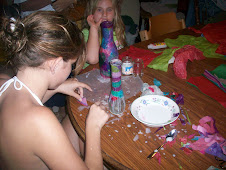 Girls making colorful vases