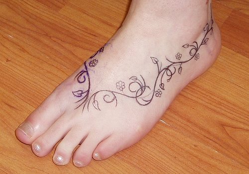 [15+Awesome+Tattoos+on+Foot+15.jpg]