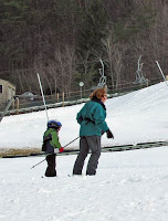mom and child on skis
