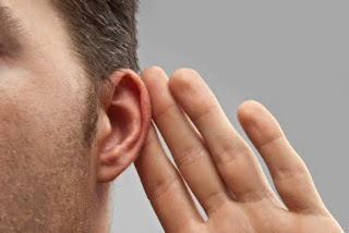 Man holding ear do men pretend they can't hear you?