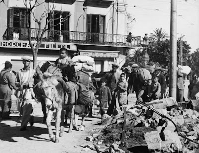 Refugiados volviendo a Málaga