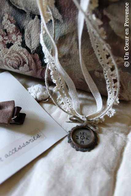 A necklace with lace and medal