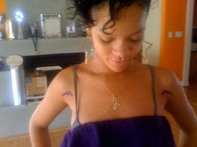 rihanna tattoos on hand. Rihanna Has New TatsGUNS!