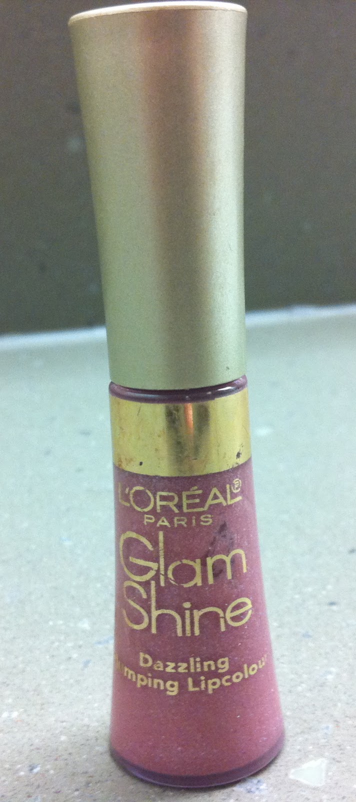 Swatches Galore! L'Oreal Glam Shine Dazzling Plumping Lip Gloss in