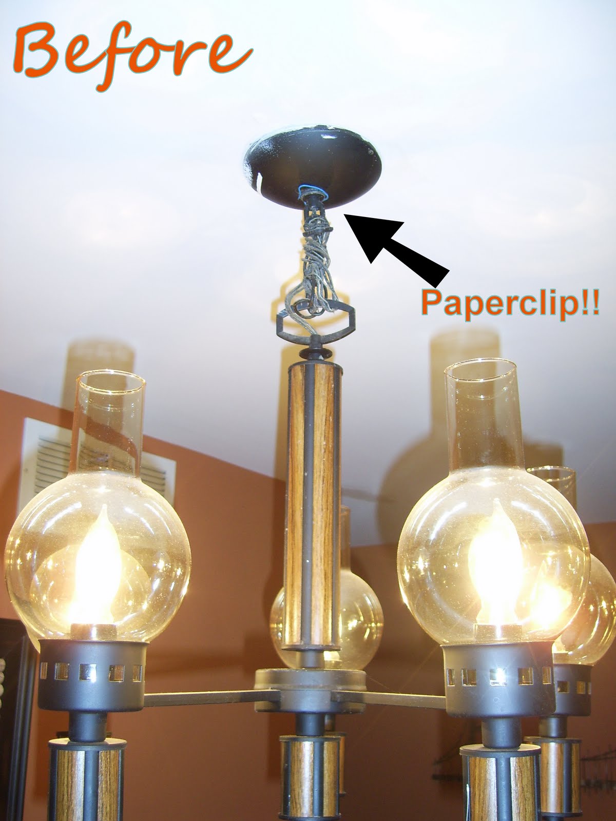 Remodelaholic Diy Wine Glass Chandelier Guest Project Please Take Notice Of The Blue Paperclip Holding Canopy Plate In Place Very Classy