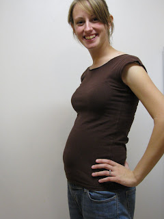 18 weeks pregnant with twins and contemplating 10 benefits of having twins first.