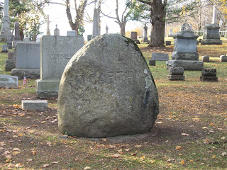 tree trunk headstone