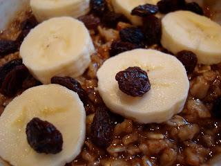 Close up of banana and raisin topped oatmeal