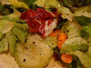 Salad topped with Maple Ginger Dijon Vinaigrette