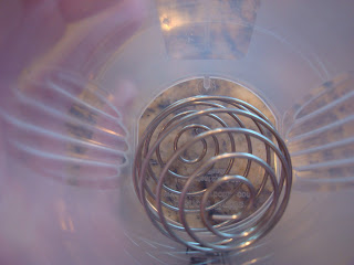 Inside blender cup showing metal blending element