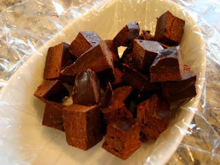 Diced up Vegan Coconut Oil Chocolate Bar in white dish