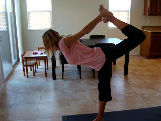 Woman doing Dancer Pose yoga pose